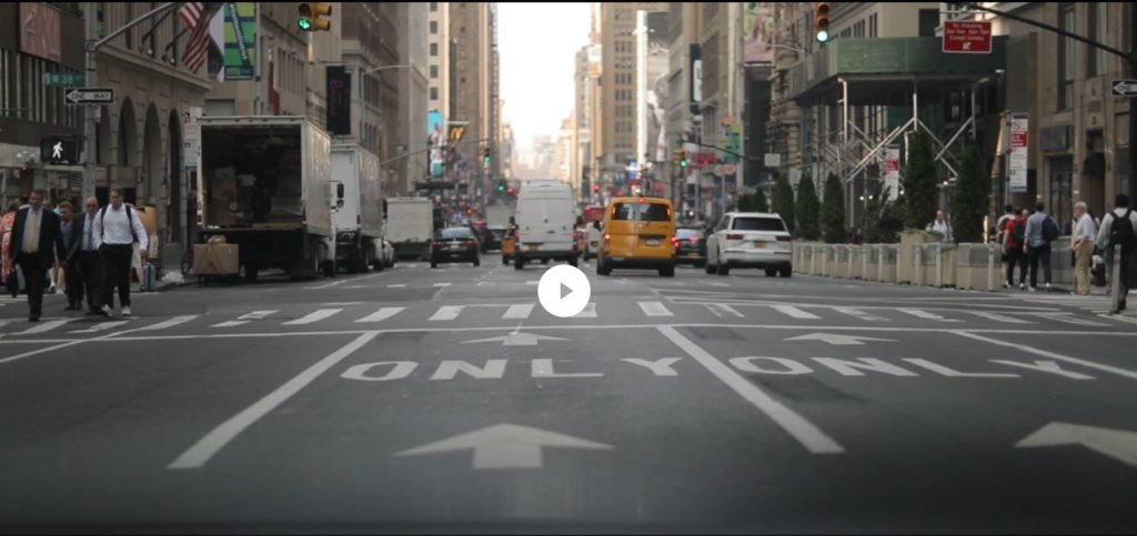 Video start slide showing a street in New York near the AB Inbev headquarters in early morning